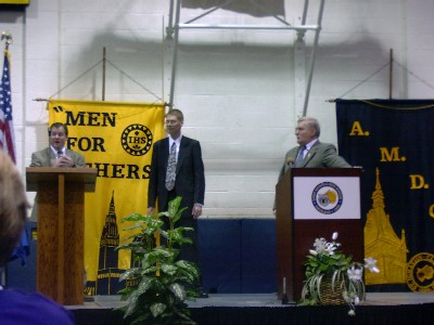 Lech Walesa, interpreter Marcin Zmudsky, and Mr. Tim Evans at Saint Ignatius High School (Jan. 23, 2002)